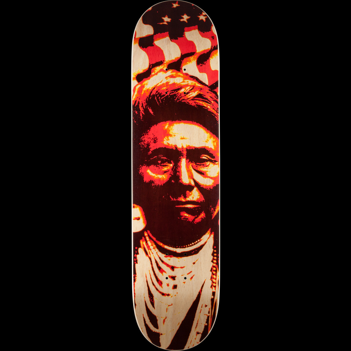 Powell Peralta Native Anerican Limited Edition - Shape 127 skateboard deck: A stencil-style portrait of a man in a feathered headdress and beaded necklaces, in red, orange and dark brown tones on natural wood, with a stars and stripes flag waving behind his head.