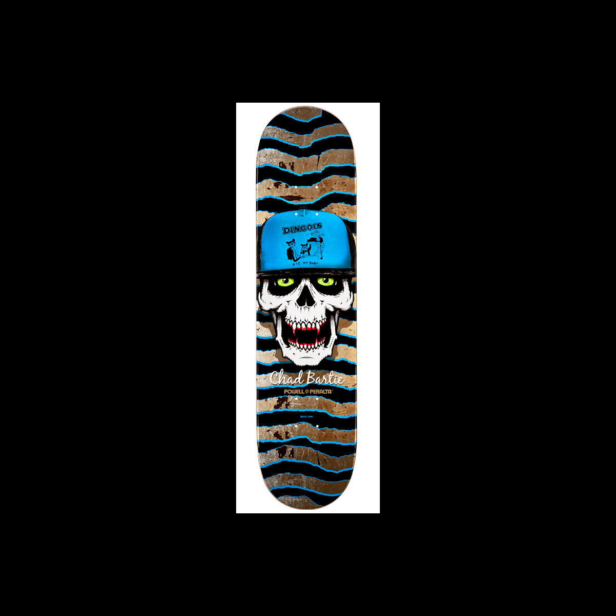 Powell Peralta Pro Chad Bartie Skull skateboard deck: A grinning skull with green eyes wears a blue trucker cap with a Dingoes print, over zigzag stripes in black, blue and tan, with the rider's name in cream script below.
