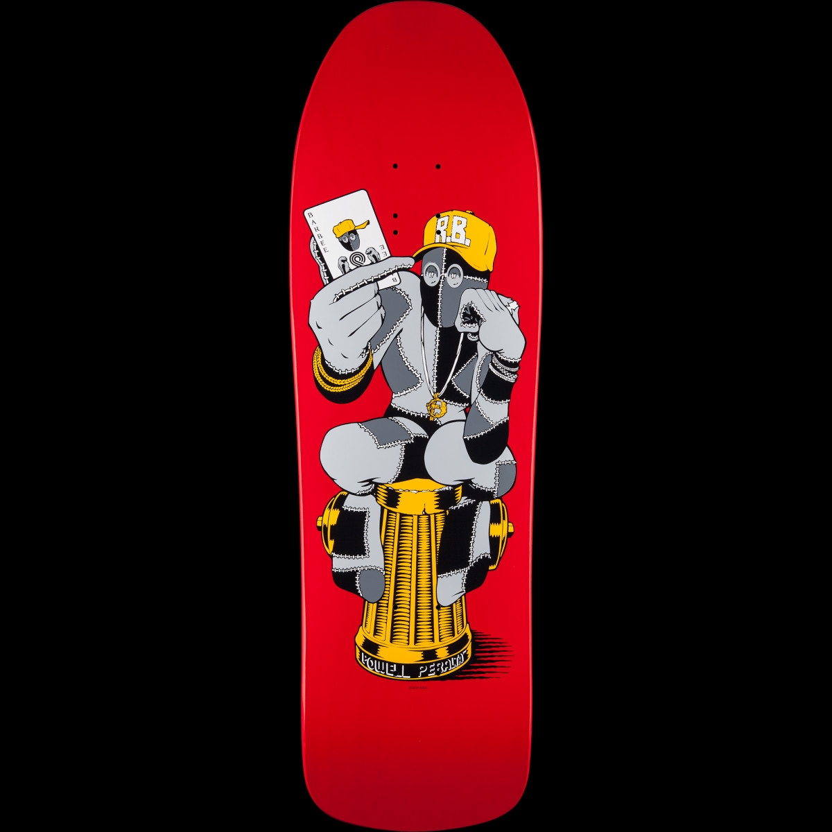 Powell Peralta Ray Barbee Hydrant skateboard deck: A patchwork-stitched figure in a yellow cap with initials, face mask and gold chains crouches on a gold fire hydrant, holding up a playing card, on a red old-school shaped deck. Brand name sits at the base of the hydrant.