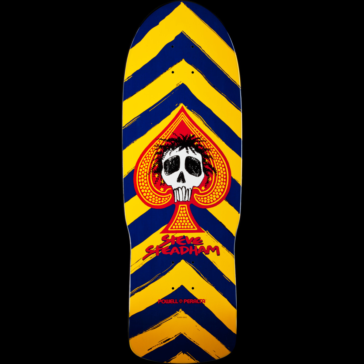 Powell Peralta Steve Steadham Skull and Spade Blue/Yellow skateboard deck: Old-school shape deck with bold navy and yellow chevron stripes, a red spade at the centre holding a skull with spiky dark hair, and the rider's name in red brush lettering below.