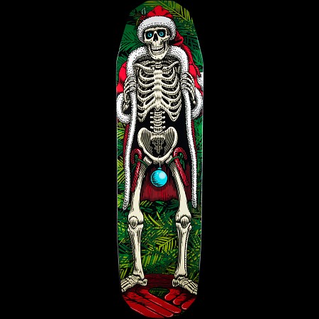 Powell Peralta Holiday 2014 skateboard deck: A skeleton wearing a Santa hat and a red, white-trimmed cloak held open stands among fir branches, with a blue bauble hanging at its pelvis. Red presents or ribbon fill the bottom of the deck.