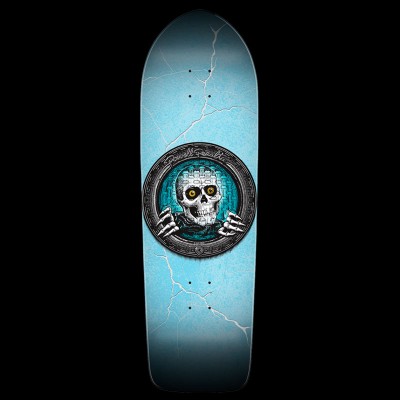 Powell Peralta Pool Light Ripper Large - Turq skateboard deck: A white skull with amber eyes and skeletal hands peers from a round porthole-style pool light, with a signature across the rim. It sits on a pale turquoise cracked-ice or lightning-style background.