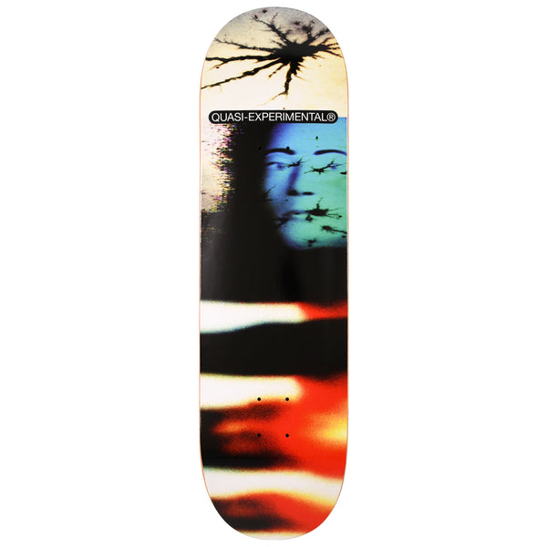 Quasi Altered States skateboard deck: A blurred, glitchy photo collage: a blue-green face with black ink-splatter cracks, a cracked black starburst at the nose and smeared white, black and red-orange streaks below. A black pill label carries the Quasi-Experimental text.