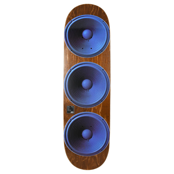 Quasi Barker Speakerhead skateboard deck: Brown wood-stained deck with a photographic print of three large blue speaker cones stacked down the length of the board. A small black label sits beside the lowest speaker.