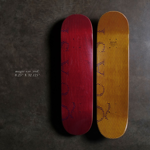 Quasi Magic Eye8.25 - Red skateboard deck: A fine zigzag op-art pattern covering the deck, with faint purple lettering underneath, shown in red and in yellow versions side by side. A caption names the red one as magic eye.