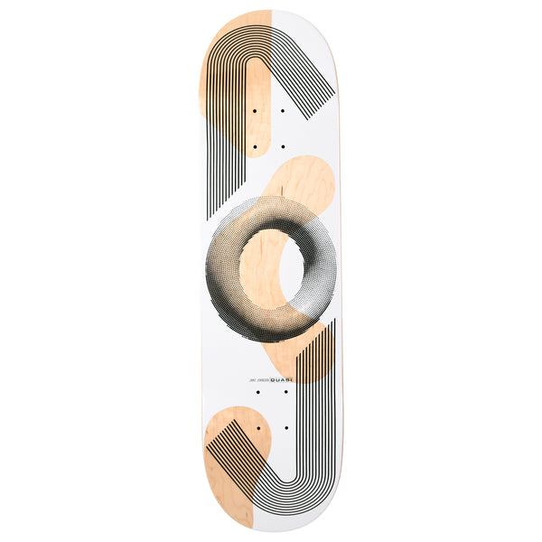 Quasi Johnson Boomerang skateboard deck: White deck with natural maple patches and abstract geometry: sets of black parallel lines curving in boomerang bends at each end and a halftone-dot black ring in the middle. Small 'Jake Johnson Quasi' text.