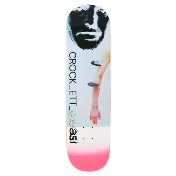 Quasi Crockett Bio skateboard deck: Collage of a large black and white photographic face at the nose and a pale arm balancing two dark discs, on a pale blue ground. Lettering runs vertically with the Quasi logo, and the tail fades to pink.