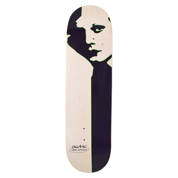 Quasi Johnson Milan skateboard deck: Natural wood deck with a stark black and white high-contrast portrait of a man's face looking down, cropped to one side, with a dark vertical band beside it. Quasi and Jake Johnson in an oval logo at the tail.