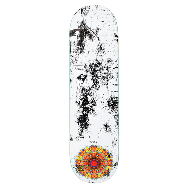 Quasi Nirvana skateboard deck: White deck with distressed black speckled texture, faint photographic figures and scribbled text at the nose, and a bright orange, red and blue kaleidoscopic mandala at the tail.