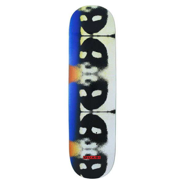 Quasi Themes skateboard deck: Repeated blurred black spray-stencil alien faces with white eyes stacked down the deck on a cream ground, with blue and orange gradient smudges at the edges and a small red Quasi label.
