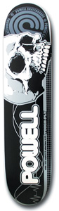Powell Peralta Jones Skull skateboard deck: Large grey and white skull in profile with detailed teeth on a black deck, with concentric circles at the top, fine grid and line details, and the Powell name in big white outlined letters near the bottom.