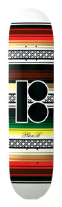 Plan B Ricos skateboard deck: Horizontal bands of woven blanket-style stripes in red, black, green, yellow and gold, with lattice patterned strips, and a large black Plan B logo in the centre on a white deck. Small script signature below.