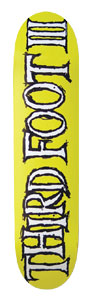 Third Foot Sketchlogo skateboard deck: The words THIRD FOOT III in large white letters with rough black outlines, running vertically up a plain bright yellow deck.