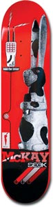 Seek Mckay Rabbit skateboard deck: A grey-and-white spotted rabbit sits upright on a red deck, with a small telephone-style device and wiring at the upper left. Large lettering reads McKay Seek, over black and red stripes.