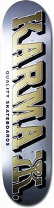 Karma Kizla Silver skateboard deck: A metallic silver-blue deck with large gold and black 3D block lettering reading KARMA, with QUALITY SKATEBOARDS in small black text below and a stylised logo at the tail.