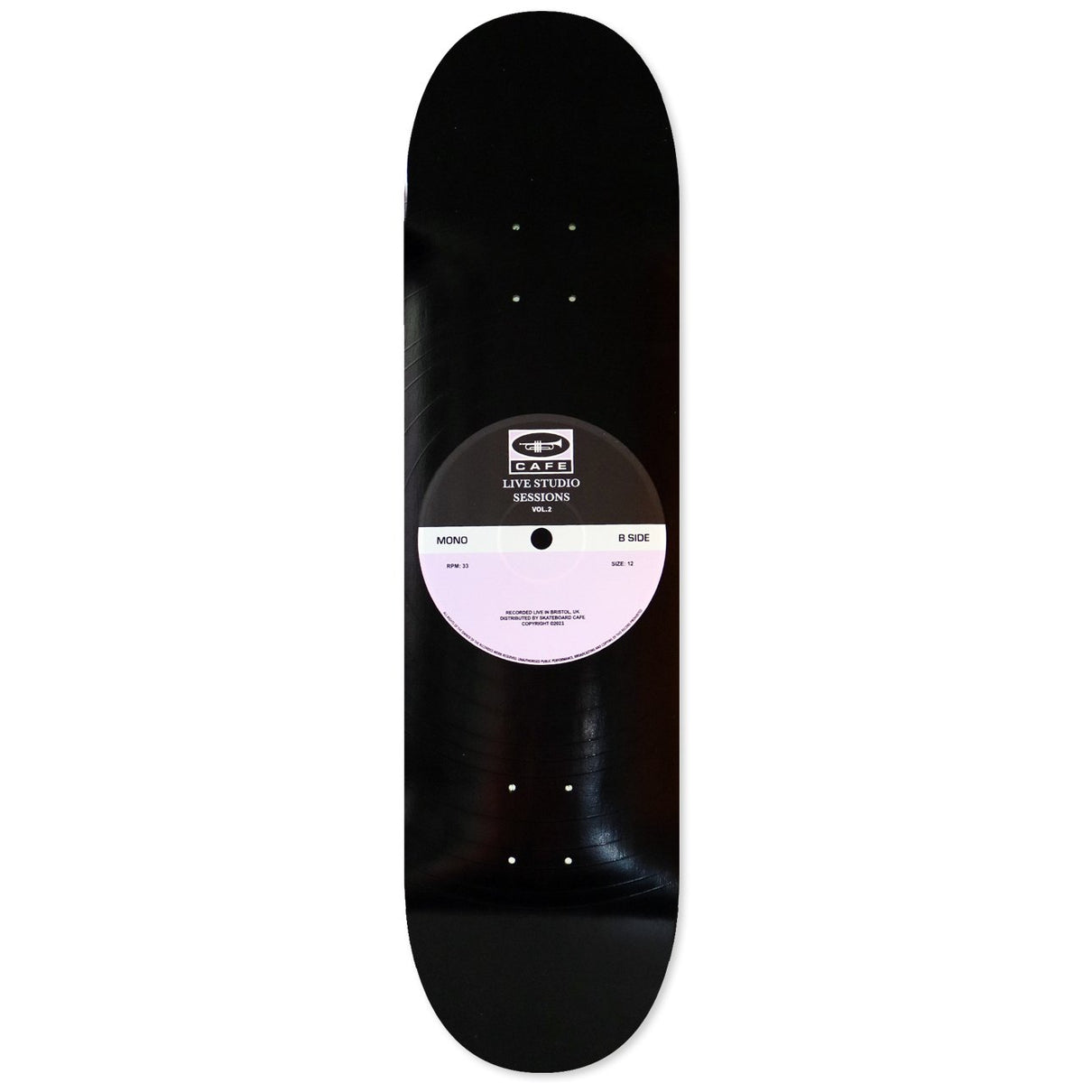 Skateboard Cafe 45 Black/Lavender skateboard deck: Deck designed as a vinyl record with grooves and a centre label in black and lavender reading Live Studio Sessions Vol.2, with a Cafe trumpet logo and small print.