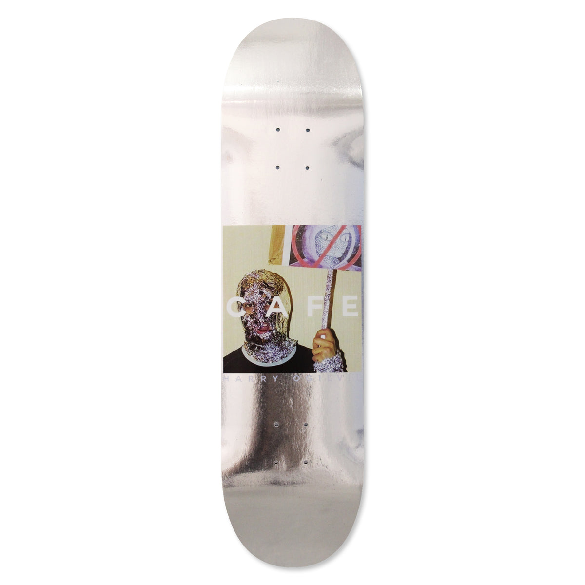 Skateboard Cafe Urban Shapeshifting Reptilian Harry Ogilvie Tin Foil skateboard deck: Shiny silver foil deck with a square colour photograph of a person in a crumpled tin foil mask holding a protest sign, with CAFE in white capitals across it and the rider name beneath.