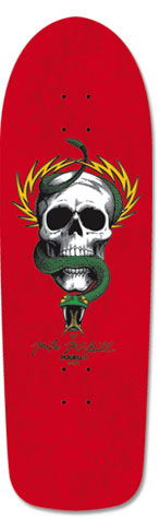 Powell Peralta McGill Red skateboard deck: A skull with a green snake coiled through it and yellow flames or lightning bolts fanning out behind, on a red deck. A handwritten signature and Powell logo sit below.