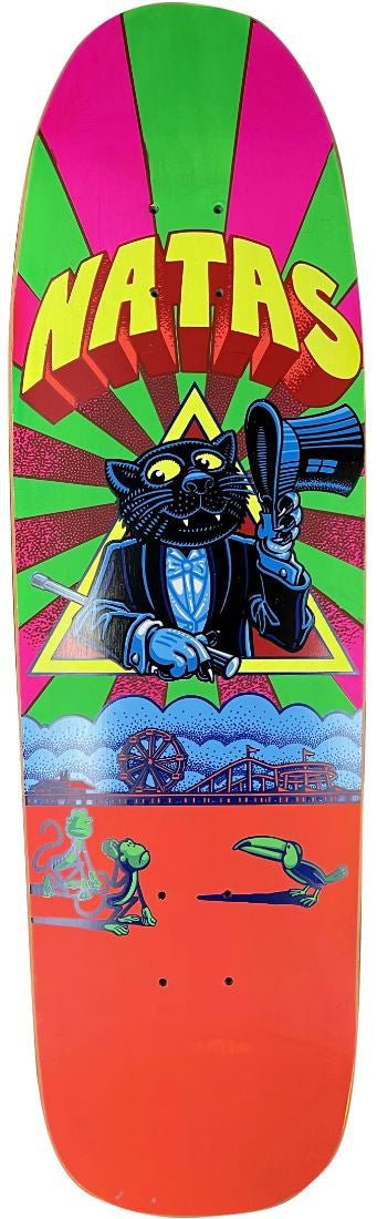101 Natas Kaupas Panther Screened skateboard deck: Old-school shaped deck with a panther in top hat and bow tie holding a cane, in front of a yellow triangle and green, pink and yellow sunburst, with NATAS in big yellow 3D letters. Below are a fairground rollercoaster, a monkey and a toucan on orange.