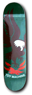 Toy Machine Toy Machine Eagle skateboard deck: A large dark brown eagle with a white head swoops down over a green background, with red flame-like shapes beneath its claws and white brand lettering at the bottom.