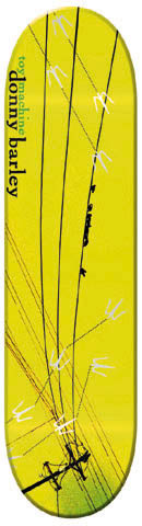 Toy Machine Donnny Barley Wire skateboard deck: Photograph of power lines and a telegraph pole against a yellow-green wash, with small white bird silhouettes scattered along the wires. The rider and brand names run down the left edge in lower-case type.