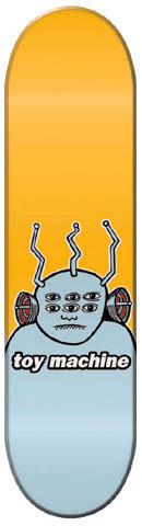 Toy Machine Transmission skateboard deck: A cartoon grey-blue monster with six eyes, stitched mouth, three bent antennae and ear-like speakers, above the Toy Machine wordmark. Orange upper deck fades into pale blue at the base.