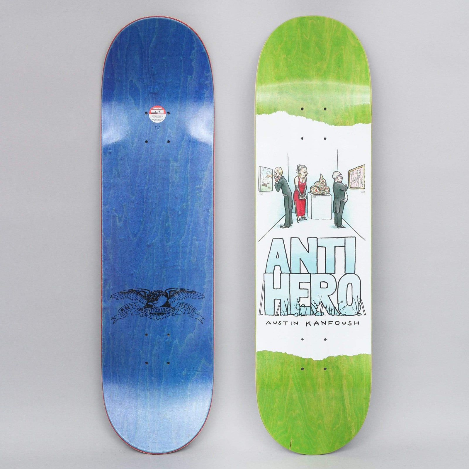 Anti Hero Kanfoush Expressions skateboard deck: Cartoon gallery scene on a white torn-paper panel: a woman in a red dress and two men in suits look at a sculpture of a coiled pile on a plinth, with framed pictures on the walls. Large pale blue ANTI HERO lettering below, on a green-stained deck.