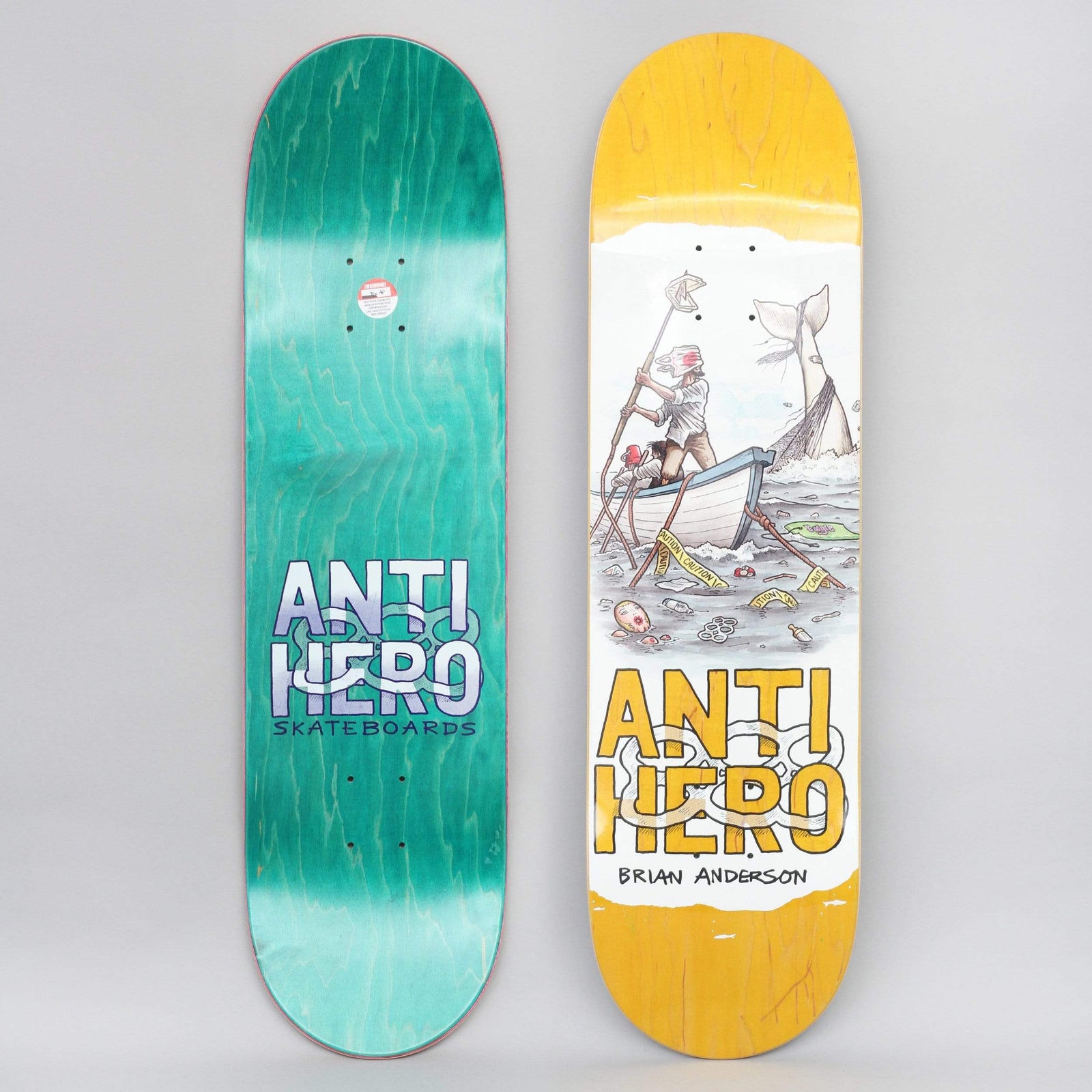 Anti Hero BA Plastics skateboard deck: Yellow-stained deck with a watercolour-style scene of a man standing in a rowing boat spearing at a whale tail, in a sea full of floating litter and rubbish. Anti Hero logo in yellow with chain-link detail and BRIAN ANDERSON beneath; the underside is teal with an Anti Hero logo.