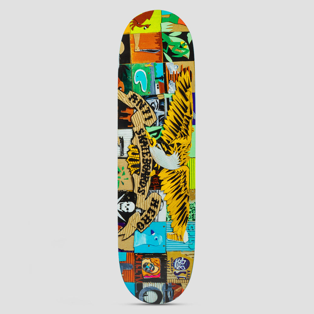 Anti Hero Team Kenji Goto Eagle Multi skateboard deck: The Anti Hero eagle with a banner in yellow and black corrugated cardboard collage, set against a patchwork of colourful cardboard tiles showing faces, a skull and other small figures.