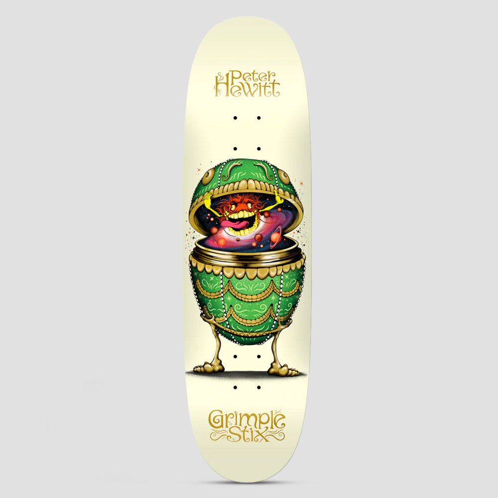Anti Hero Hewitt Grimple Stix Fabrage Egg Cream skateboard deck: Green jewelled Fabergé-style egg on clawed feet, opened to reveal a grinning yellow-toothed creature with a galaxy swirl and planets inside, on a cream deck with gold name and Grimple Stix lettering.