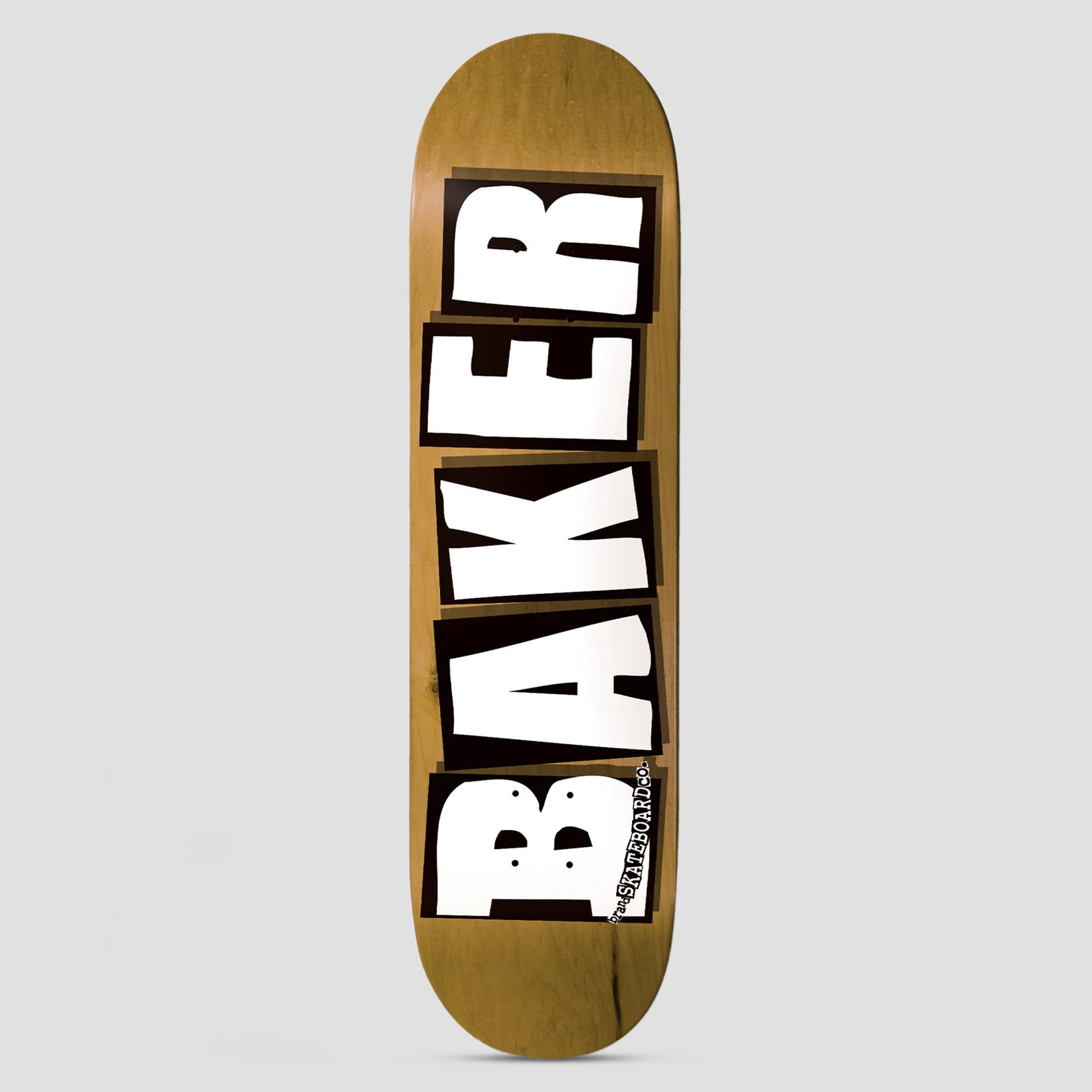 Baker Brand Logo Veneers skateboard deck: Baker in large white block capitals on black rectangles, stacked down the deck, with a small Skateboard Co. tag at the bottom, over a natural brown wood-stained veneer.