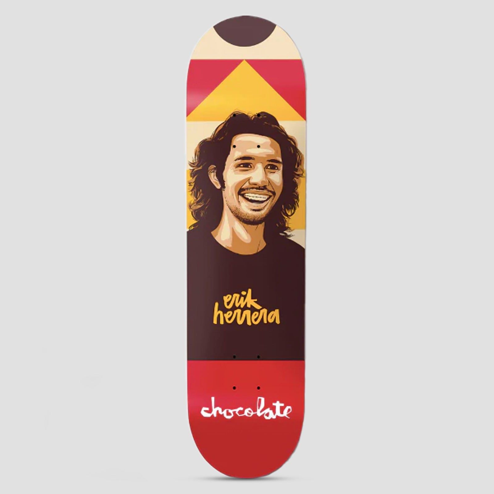 Chocolate Eric Herrera Hecox Portrait skateboard deck: Illustrated portrait of a smiling long-haired bearded man in a dark top with Erik Herrera in yellow handwriting, on geometric red, yellow and cream blocks, with Chocolate logo at the tail.
