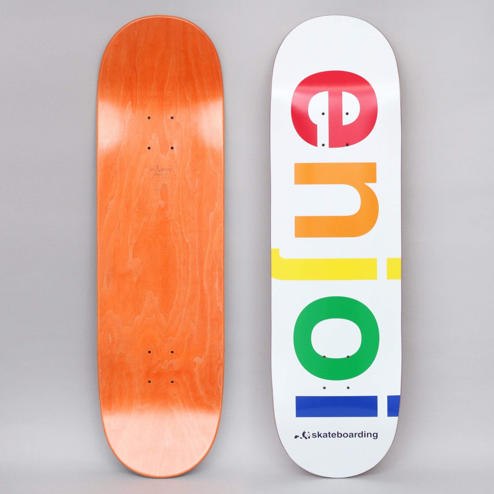 Enjoi Spectrum R7 White skateboard deck: Large lower-case 'enjoi' lettering set vertically, each letter in a different spectrum colour (red, orange, yellow, green, blue), on a white deck. Small panda logo and 'skateboarding' in dark type at the tail. Orange underside also shown.