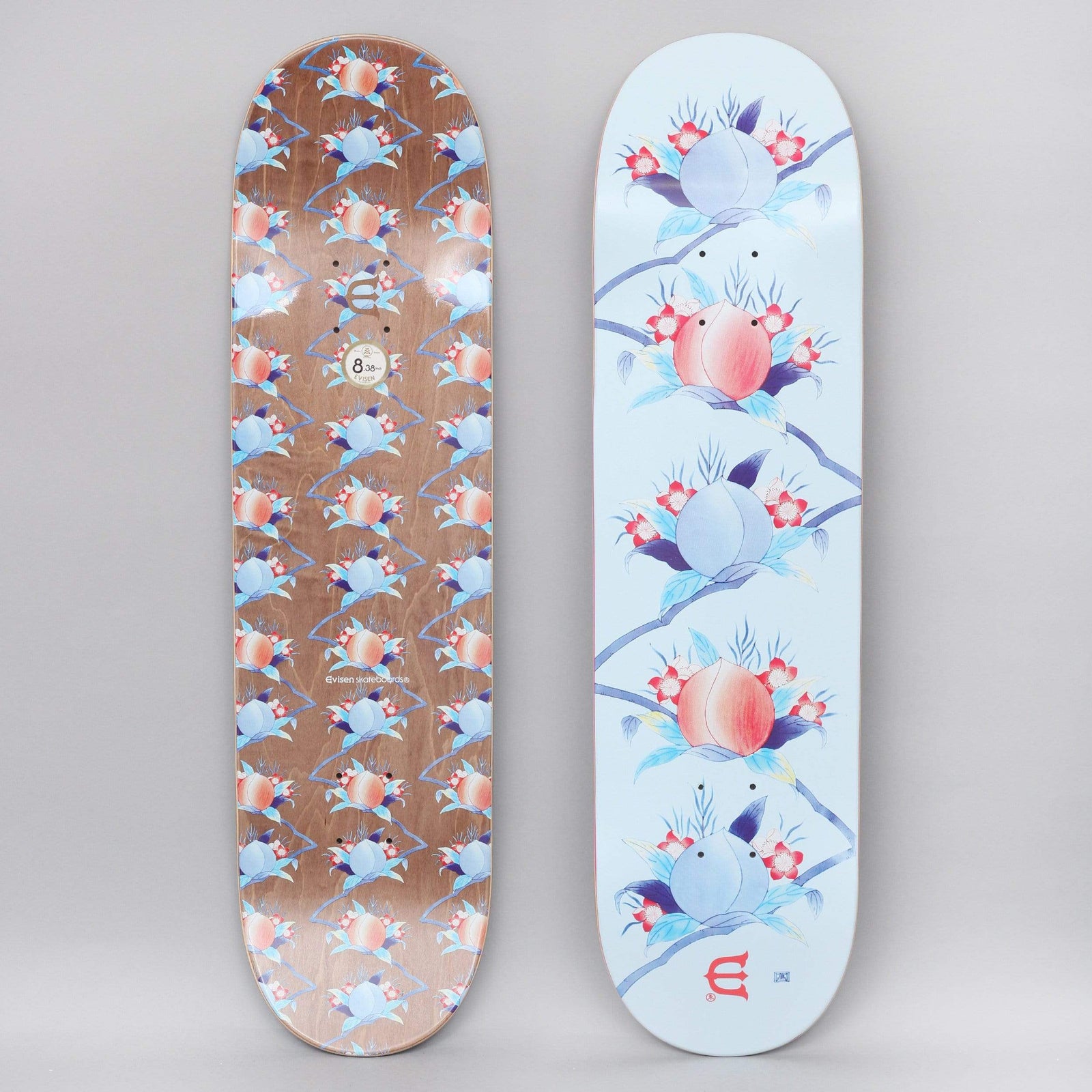 Evisen Hip Five Blue skateboard deck: Pale blue deck with a vertical column of five illustrated peaches among flowers, leaves and branches, with a small red Evisen logo at the tail. The underside repeats the peach pattern all over.