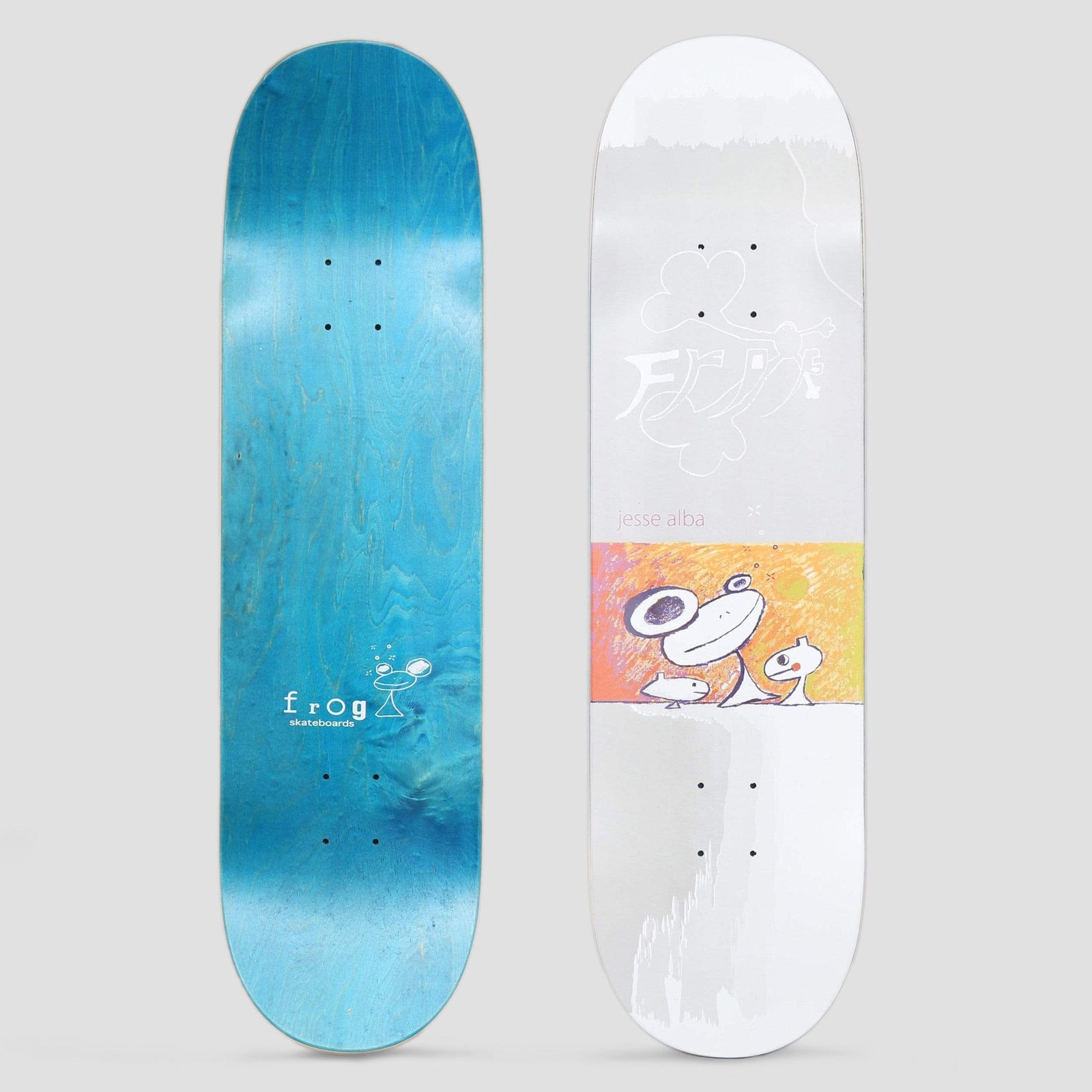Frog Jesse Alba Grey skateboard deck: Pale grey deck with a faint white outline of the Frog name and a crayon-style orange panel showing a big-headed frog-like creature with two smaller round creatures. The name jesse alba is printed above. The underside is turquoise with a Frog skateboards logo.