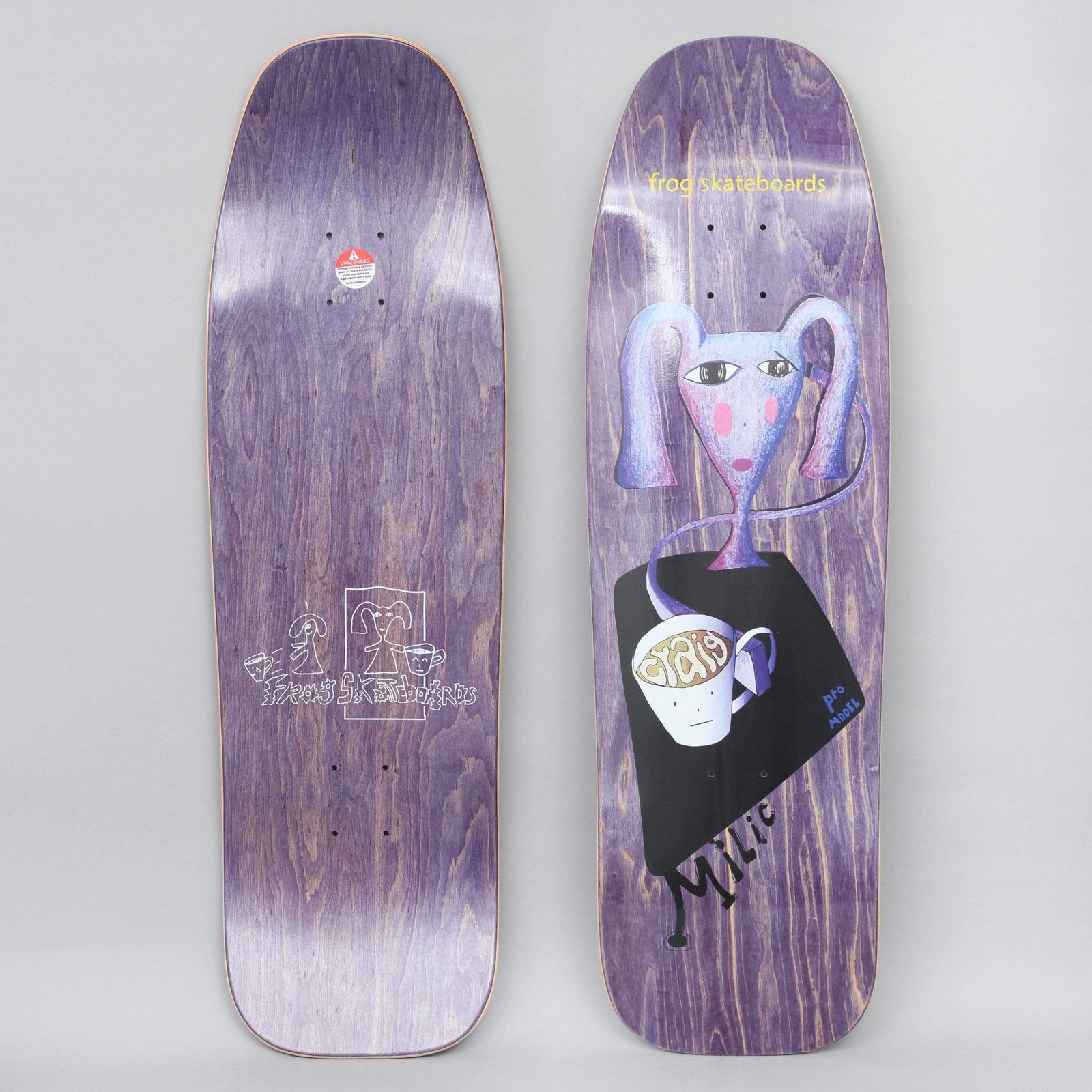 Frog Craig Milic skateboard deck: Naive painted figure with a long lilac face, bunches and pink cheeks on a thin neck, above a black triangle holding a smiling coffee cup. Shaped deck on a purple stain with frog skateboards text at the top.