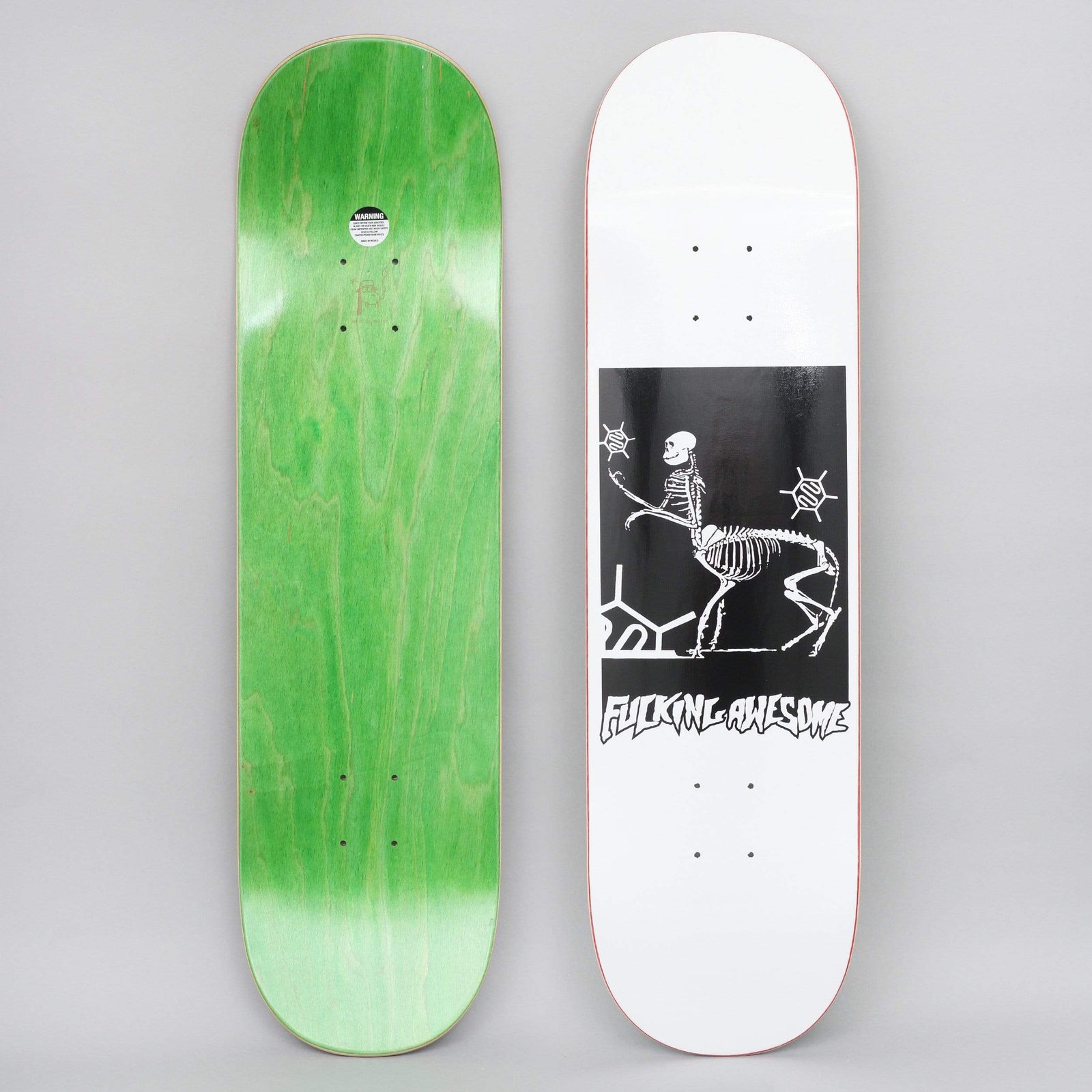 Fucking Awesome Centaur White skateboard deck: Black square panel on a white deck showing a white skeleton centaur, with a human skeleton torso on a horse skeleton body, between two small spiky emblems. Hand-drawn Fucking Awesome lettering underneath.