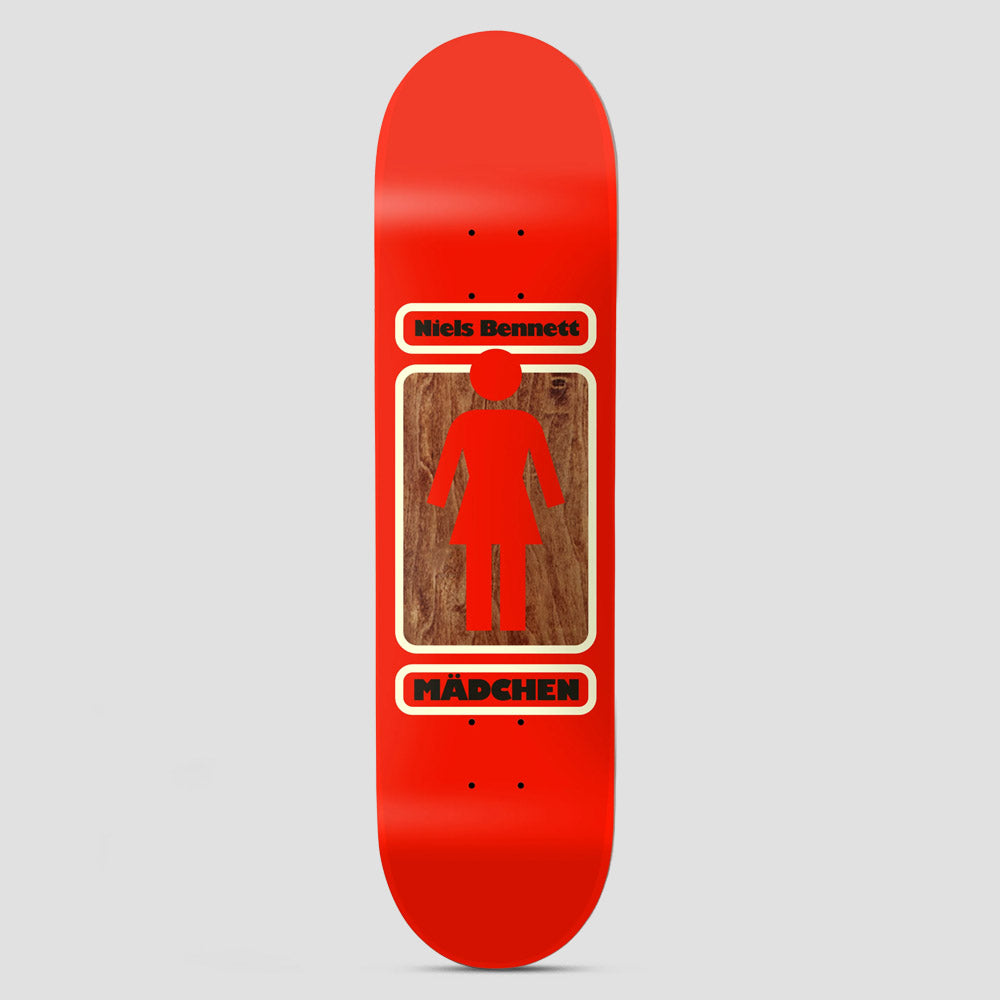 Girl 93 Til W41 Niels Bennett Red skateboard deck: The Girl logo, a red female pictogram, sits on a wood-grain panel in a cream rounded frame, with 'Niels Bennett' above and 'Mädchen' below, on a red deck.