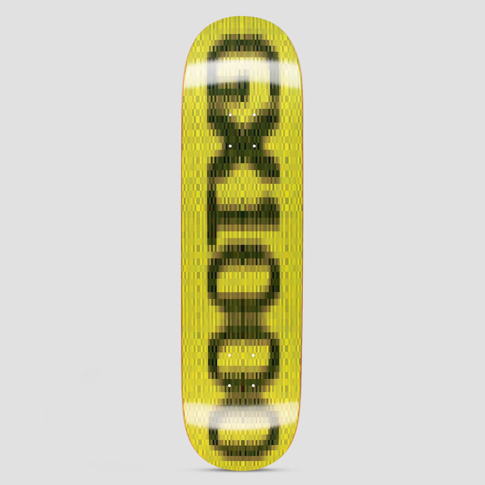 GX1000 OG Logo Blur Yellow skateboard deck: Yellow deck with the GX1000 logo in black capitals, heavily blurred and pixelated as if smeared in motion, with white blur highlights. Runs vertically along the board.