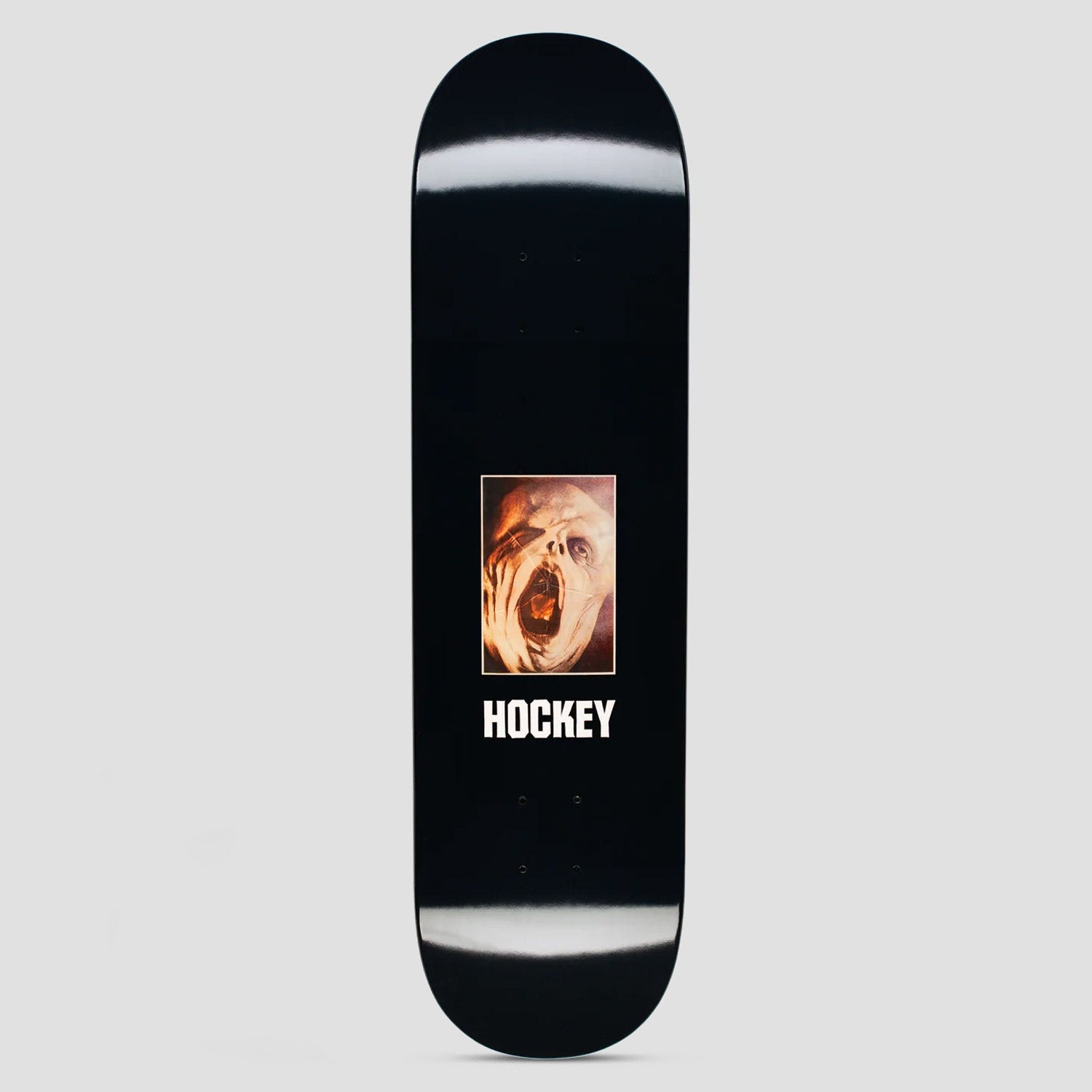 Hockey As Is Kevin Rodrigues Shape 1 skateboard deck: Small framed photographic image of a screaming, distorted pale face in orange tones, centred on a black deck above white 'Hockey' lettering.