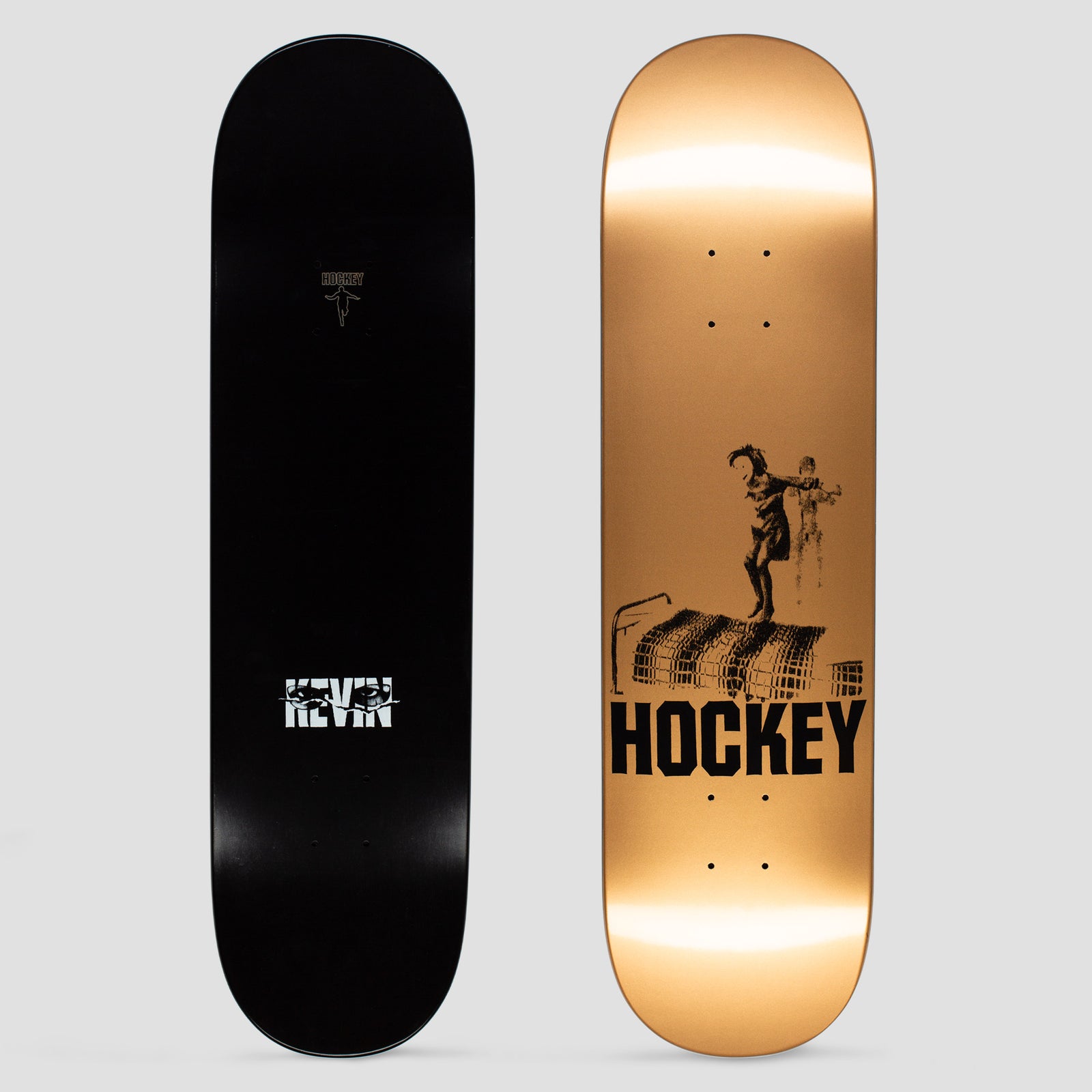 Hockey Kevin Rodrigues Jump skateboard deck: A black printed figure leaping from a mattress, with a faint ghostly figure behind, above large HOCKEY lettering on a gold metallic deck. The bottom is plain black with a Hockey logo and the name Kevin.