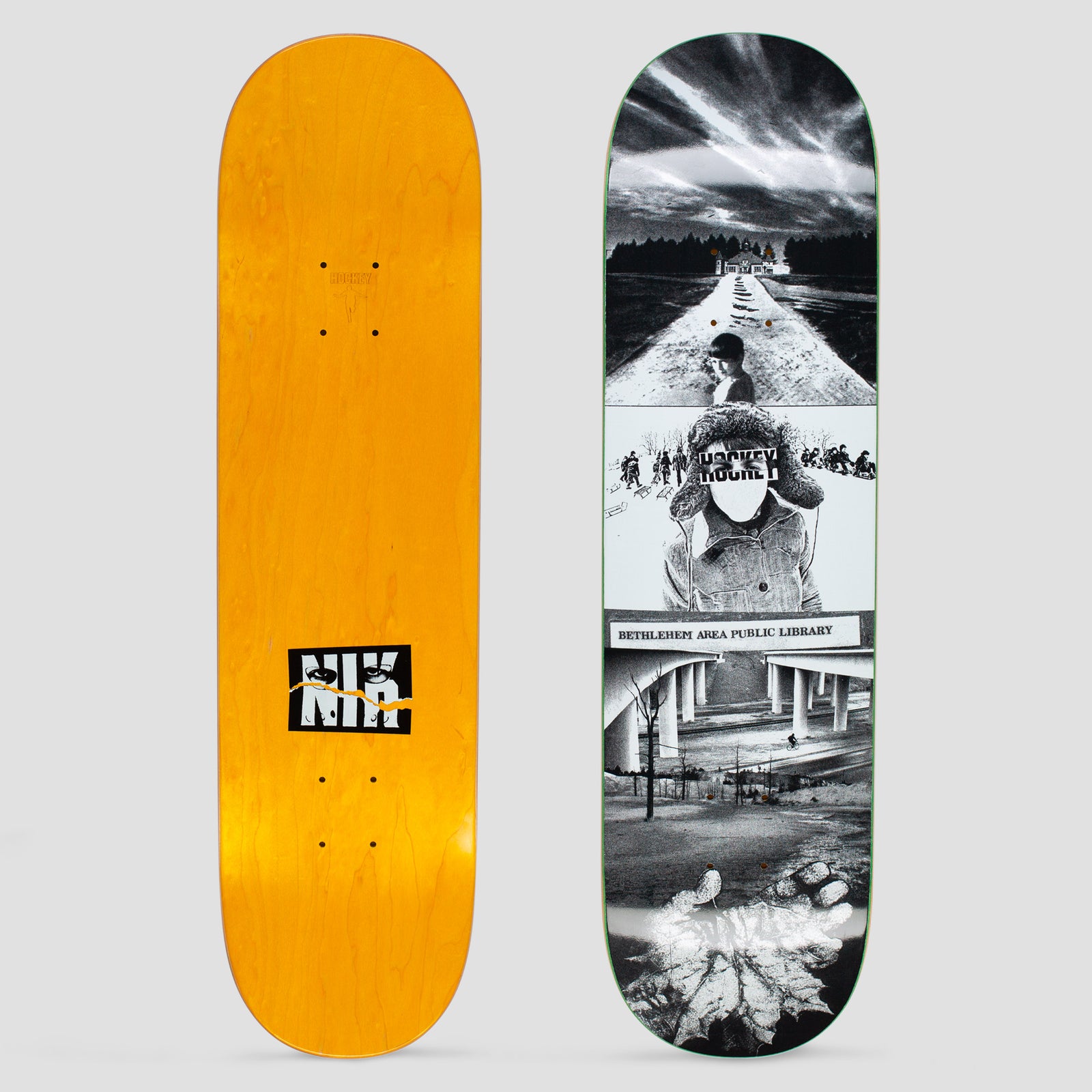 Hockey Nik Stain Bethlehem skateboard deck: Three stacked black and white photographic panels: a figure on a snowy road heading to a house, a faceless person in a fur hat with 'Hockey' across the face, and a motorway underpass labelled Bethlehem Area Public Library, with a leaf at the base. Underside is orange with a Nik logo.