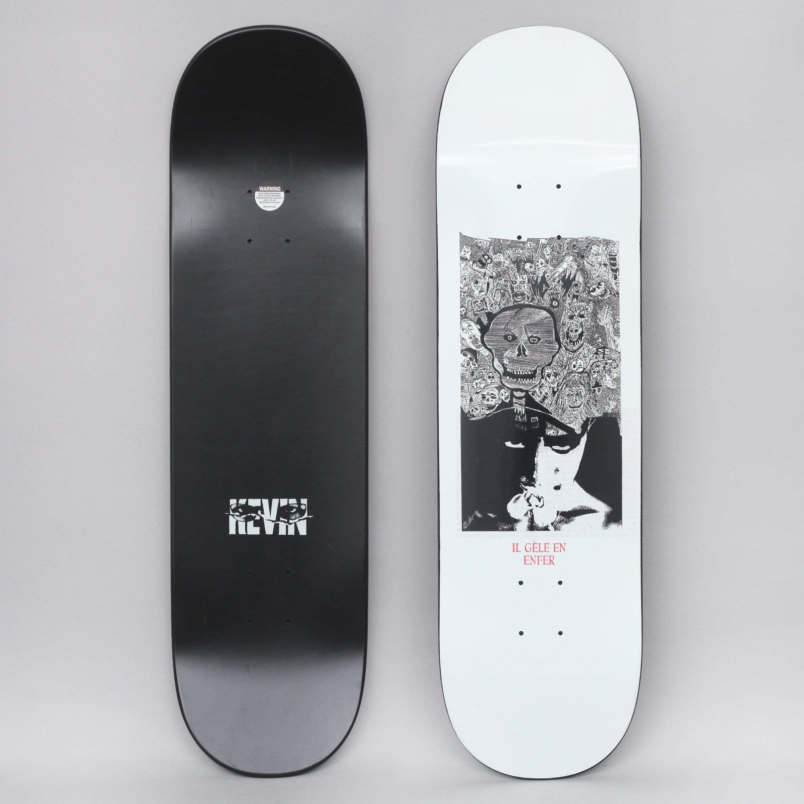 Hockey Rodriguez Disruption White skateboard deck: White deck with a boxed black-and-white image of a dense crowd of doodled monsters topped by a skull, above a smoking woman's face. Red French caption below. The black underside has the name Kevin.