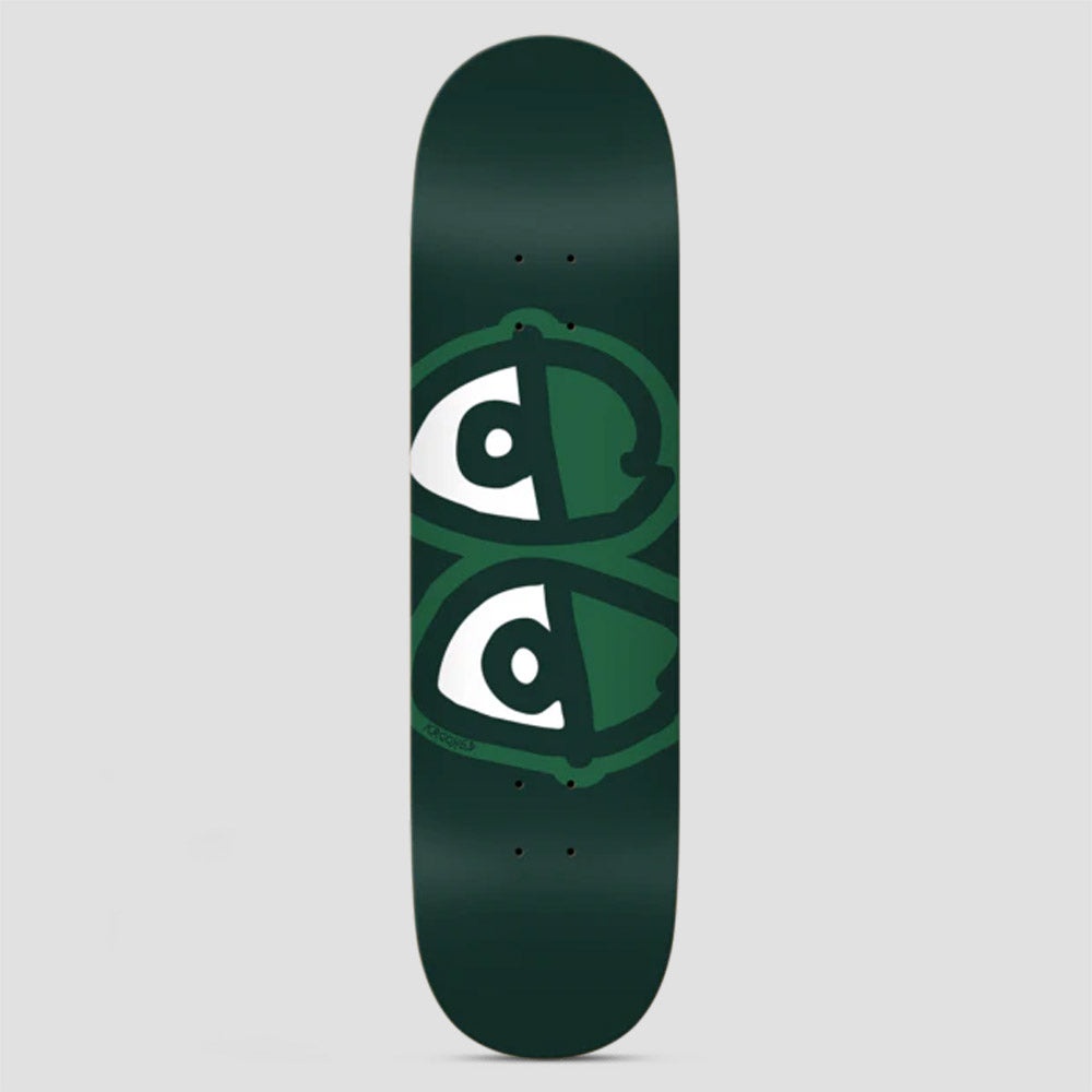 Krooked Eyes Easy Rider Green skateboard deck: Krooked eyes logo, a pair of large cartoon eyes with half of each filled green, in green outlines on a dark green deck.