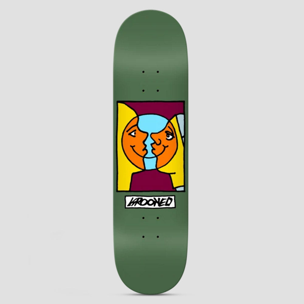 Krooked Easy Rider Moonsmile Green skateboard deck: Boxed cartoon of two orange moon-like smiling faces in profile kissing, with yellow hair and a blue gap between them, above a Krooked label on a green deck.