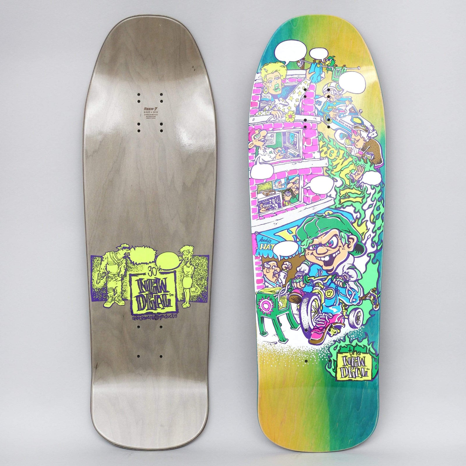 New Deal Howell Tricycle Kid Neon skateboard deck: A cartoon kid in a green cap and sneakers riding a tricycle past a pink building with windows and speech bubbles, with green slime and a stack of people above, on a green and yellow fade. New Deal logo at the tail.