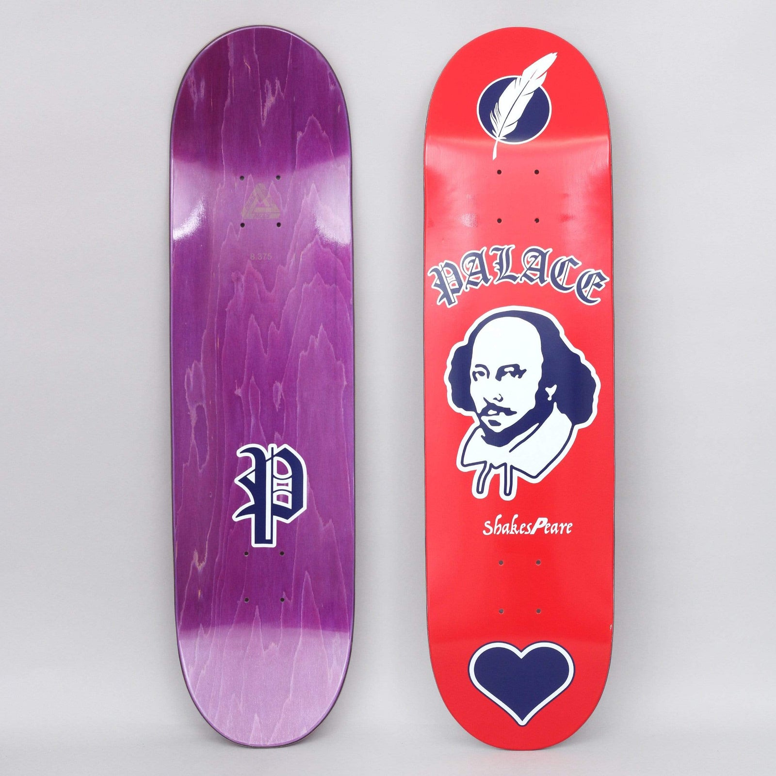 Palace As you Like It Red skateboard deck: A white and navy portrait of a bearded man in a ruff collar, under old English Palace lettering, with a quill feather in a circle above, a heart below, and the name Shakespeare, on a red deck. The photo also shows the purple underside.