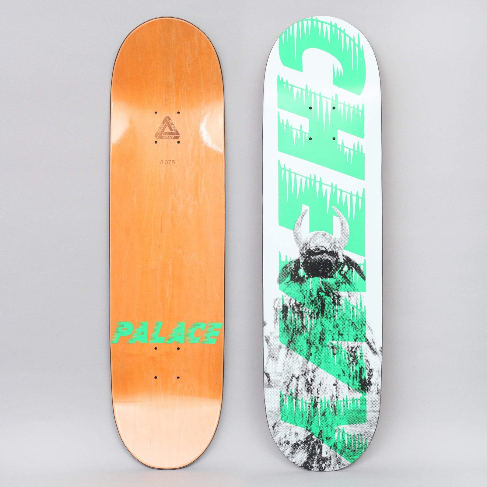 Palace Chewy S21 skateboard deck: Black and white photo of a horned, hooded figure in a rocky landscape, overprinted with large mint-green CHEWY lettering with icicle-like drips running down the deck.