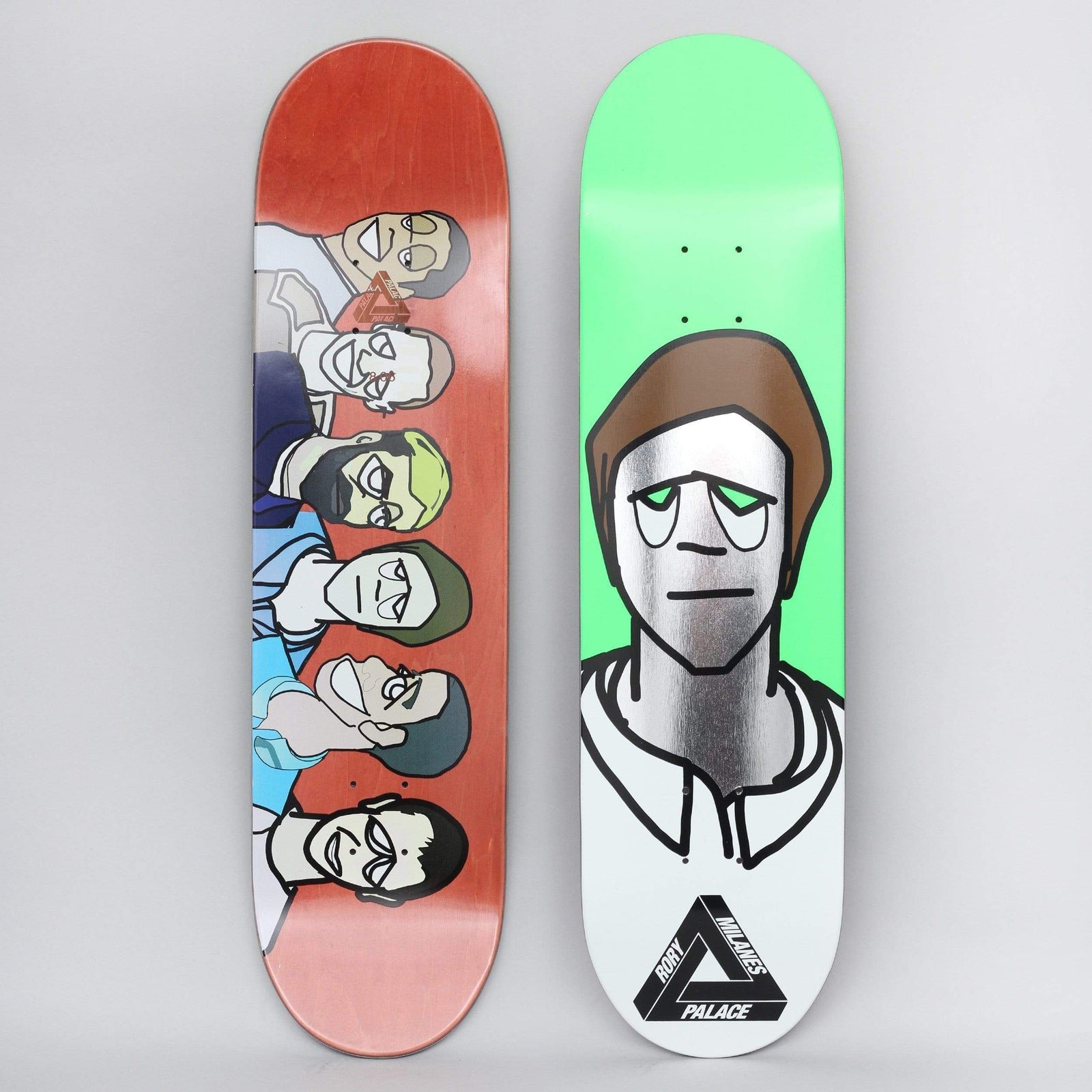 Palace Rory Pro S20 Green skateboard deck: Cartoon-style portrait of a brown-haired figure with a silver foil face and green eyes, in a white collared shirt, on a bright green ground. The other deck shows a red row of six cartoon heads.