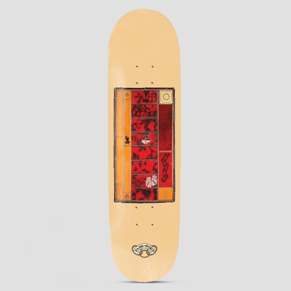 Passport Communal Tile Series Grandson skateboard deck: A rectangular panel styled like a stained-glass or tiled window, in red mottled squares with amber borders and small motifs including hands, a chain and a bird, on a cream deck with a Pass~Port ring logo at the tail.